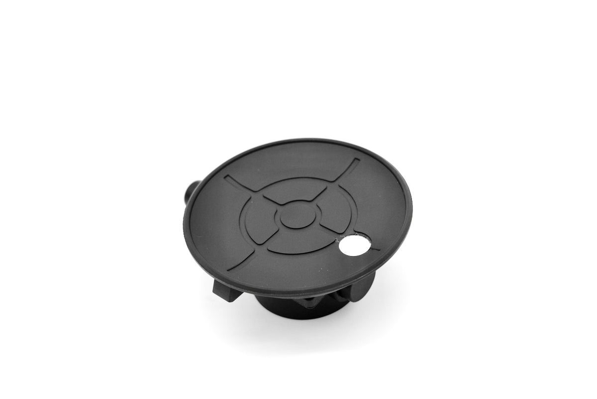 Underside of a black suction cup mount.