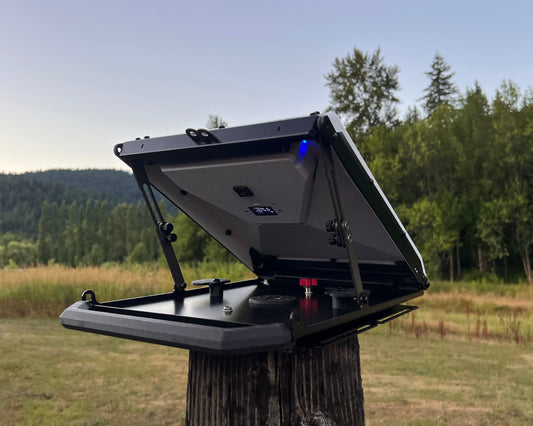 Tuff Mount with battery showing wireless power and connectivity outside resting on a fence post