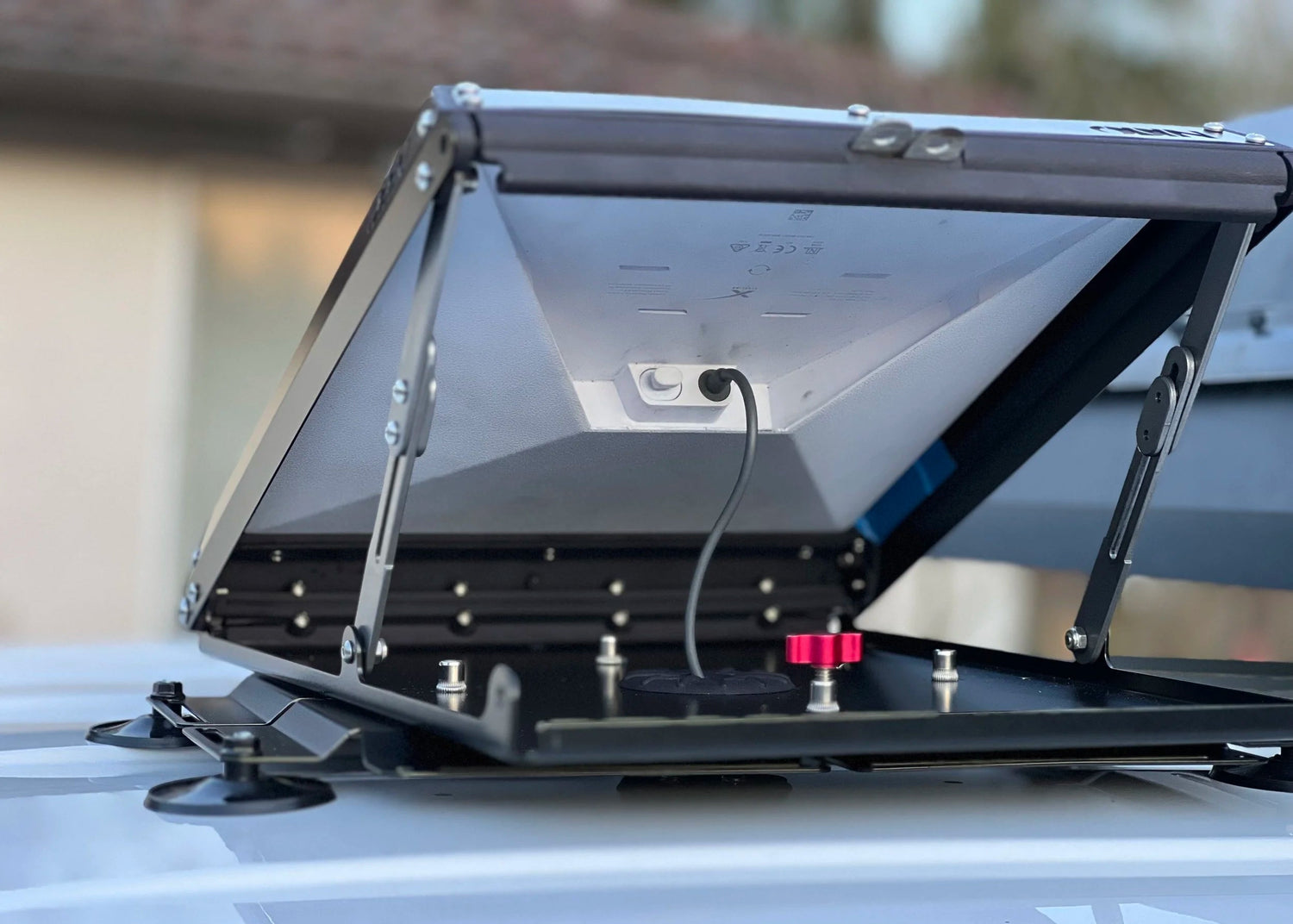Odin Starlink Mini Tuff Mount open on vehicle roof showing detail of metal frame and attachments.