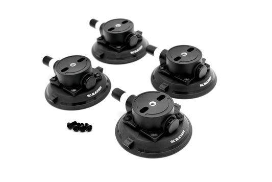 Four black suction cups to mount Tuff Mount to hard smooth surfaces.