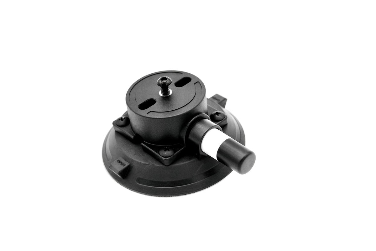 A black plastic suction cup mount with a central threaded screw and a short cylindrical protruding tube with a white band, shown on a plain white background.