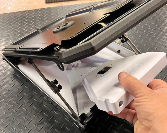 SHoing the installation of a battery pack in the Starlink Mini installed in a Tuff Mount