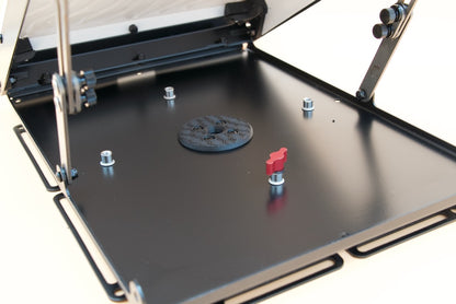 Tuff Mount for Starlink Mini showing the inside of the mount with cord pass through and locking fastener