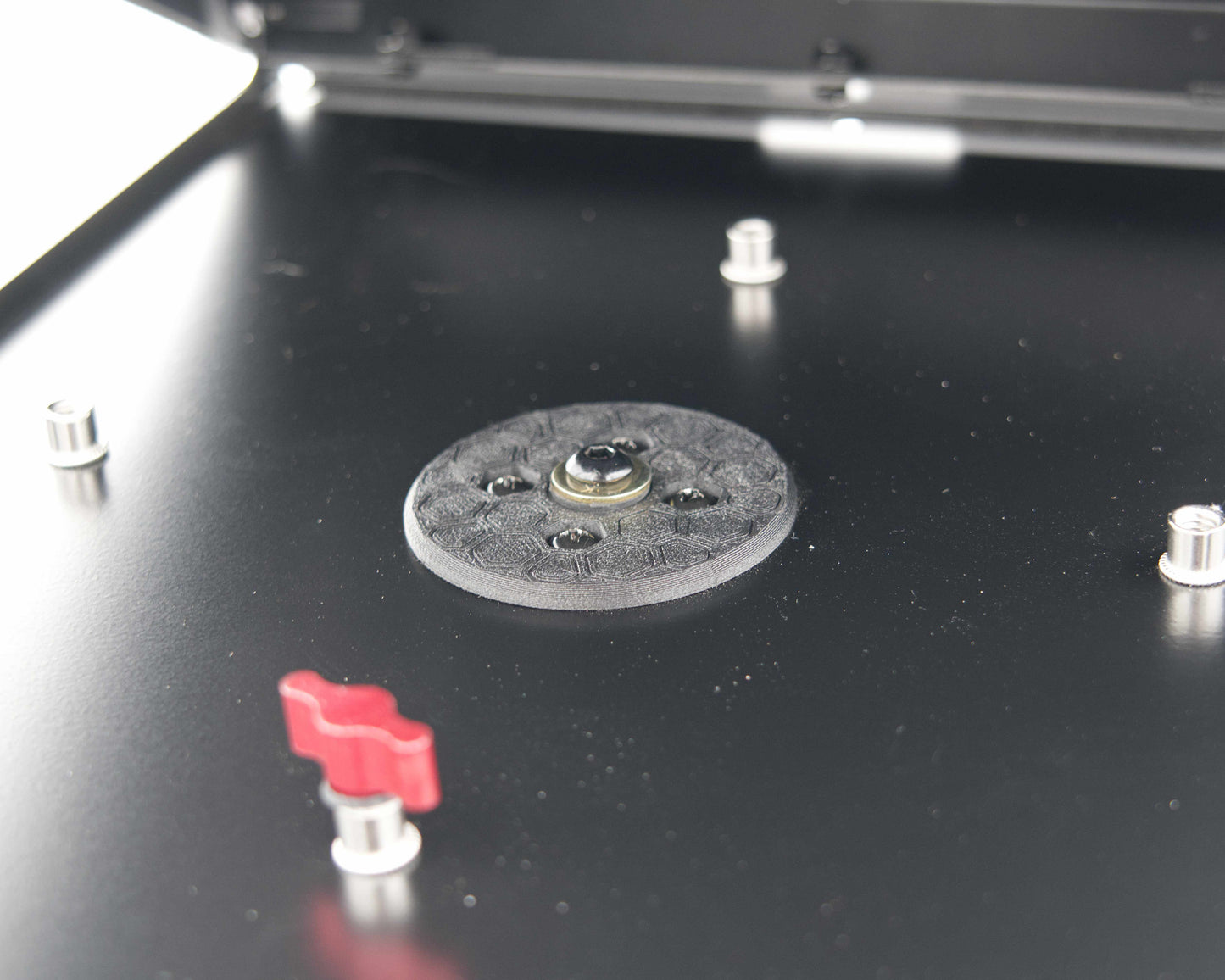 Close-up of the Tuff Mount Tripod Adapter on the inside of the Tuff Mount. Showing the fastener securely tightened. 