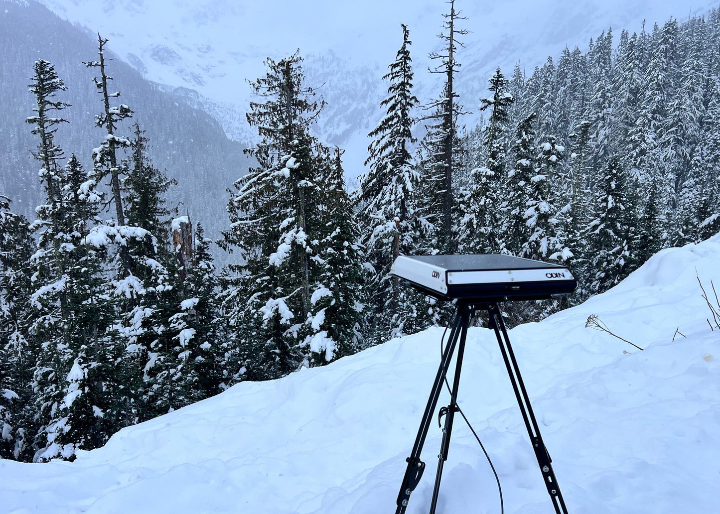 Tuff Mount on tripod in snow in the mountains