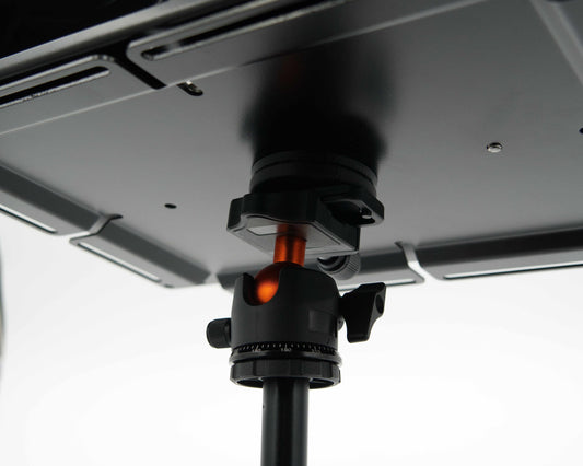 Tripod adapter for Tuff Mount shown from below on top of a tripod. 